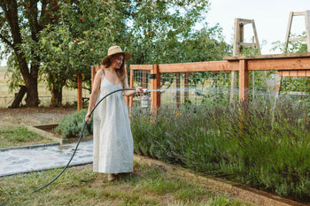 Woman watering garden