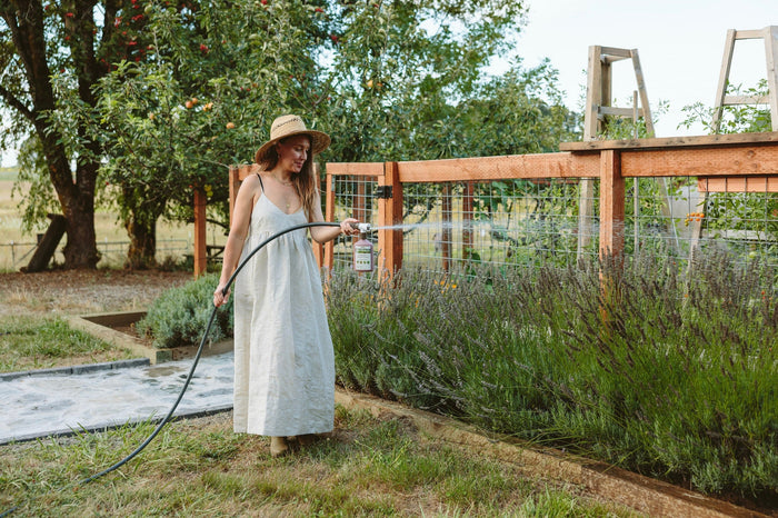 Woman watering garden